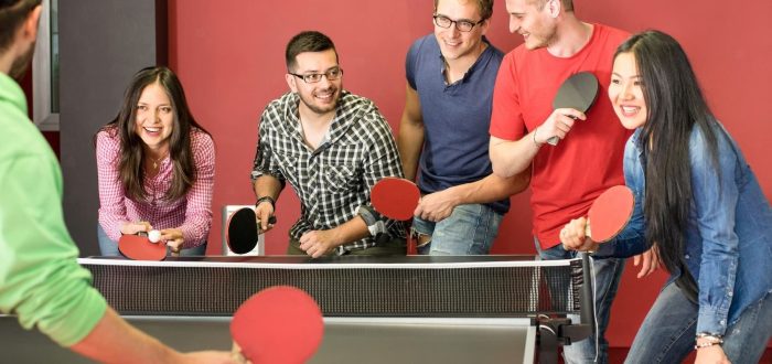 group-happy-young-friends-playing-ping-pong-table-tennis_101731-959-transformed (1)